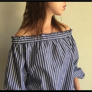 Of the shoulder top. Blue off the shoulder top